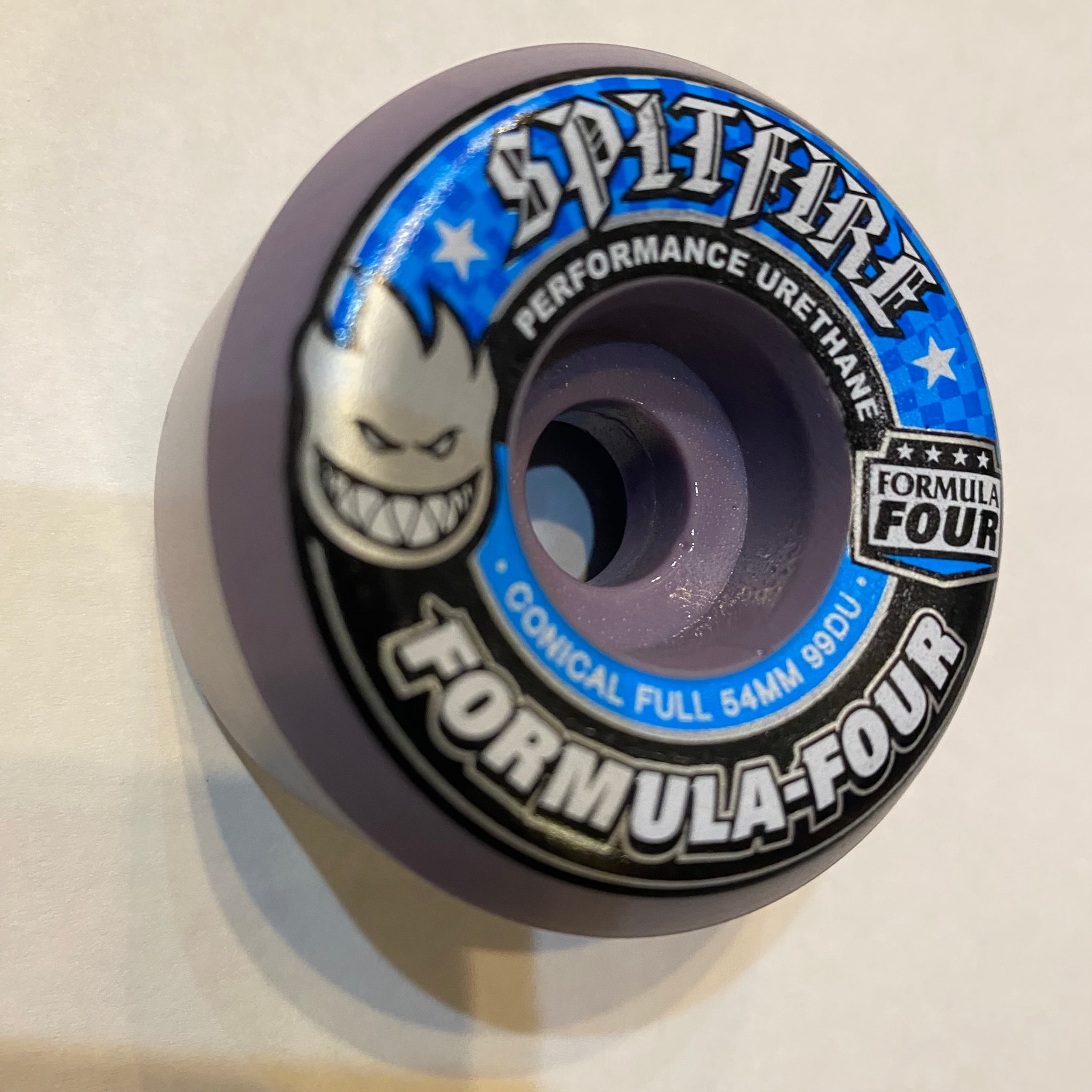 Spitfire "Conical Full- Formula Four" 54MM/99A Purple Wheels